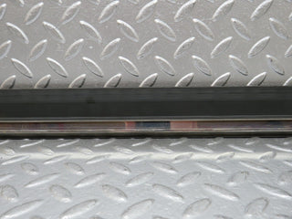 W201 Baby Benz front left door lower moulding trim used OEM