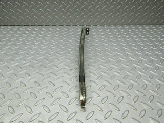 W115 rear left chrome window channel used OEM