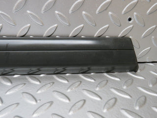 W201 Baby Benz front left door lower moulding trim used OEM