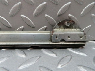 W108 front left door glass holder used OEM