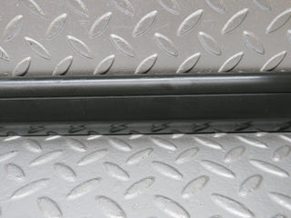 W201 Baby Benz front left door lower moulding trim used OEM