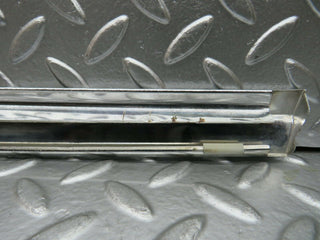 R107 SLC rear left window chrome trim used OEM