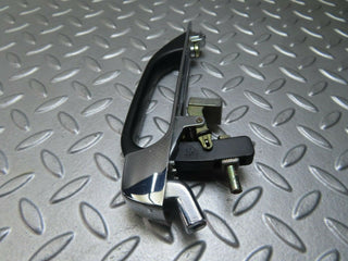 W123 exterior chrome door handle rear right used OEM