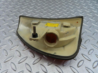 W123 indicator light front left used OEM