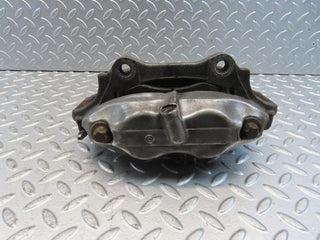 W221 front left brake caliper used OEM