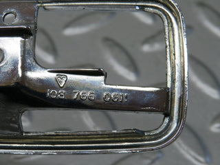 W123 chrome frame for door opener right used OEM