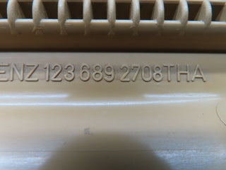 W123 under dash panel left side beige used OEM