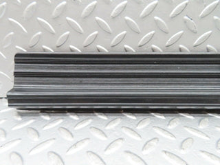 W123 front left door sill trim black used OEM