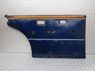 W109 rear left door card blue used OEM