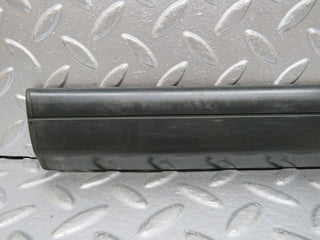 W201 Baby Benz rear left door lower moulding trim used OEM