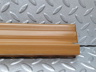 W124 front left door sill trim palomino used OEM