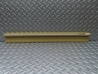 W123 front left door sill trim beige used OEM