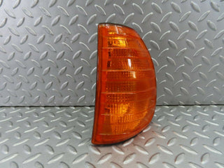 W123 indicator light front left used OEM