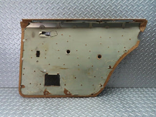 W123 rear left door card panel beige used OEM