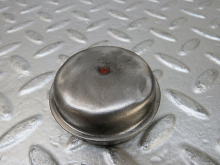W124 Coupe wheel hub locking cap used OEM