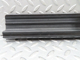 W123 rear right door sill trim black used OEM