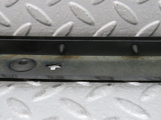 W124 Cabriolet under headlight trim right used OEM