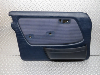 W123 front left door card blue used OEM