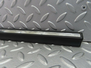 W123 front left door lower trim new OEM