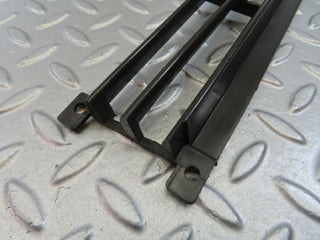 W115 front lower grill left used OEM
