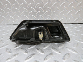 W124 interior door handle left side used OEM