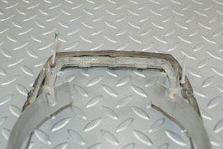 W115 headlight frame used OEM