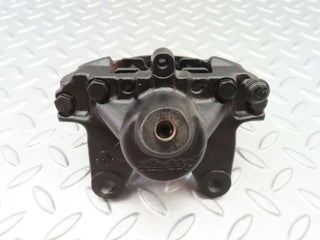 W124 Wagon rear left brake caliper used OEM