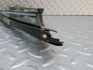 W109 front left quarter window glass used OEM