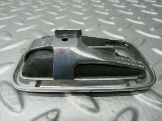 W123 Wagon chrome frame for door opener right used OEM