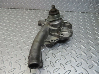 W124 water pump used OEM