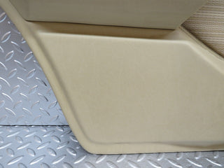 W124 rear left door card beige used OEM