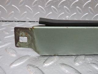 W124 under headlight trim right side used OEM