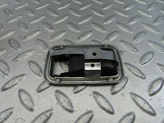 W123 chrome frame for door opener right used OEM