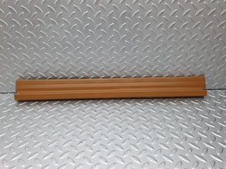 W124 front left door sill trim palomino used OEM