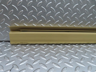 W123 front left door sill trim beige used OEM