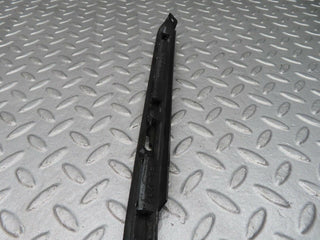 R129 SL right headlight lower trim used OEM