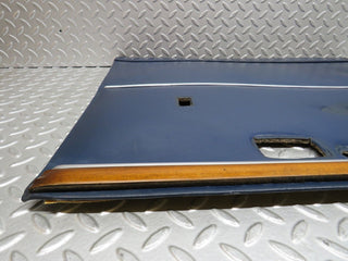 W109 rear left door card blue used OEM