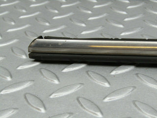 W115 centre door chrome trim front left used OEM