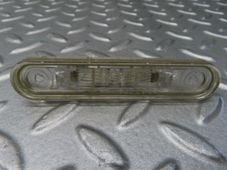 W124 number plate light pair used OEM
