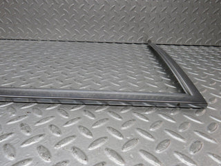 W109 rear left door chrome window frame used OEM