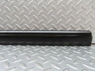 W123 front left door lower moulding trim used OEM