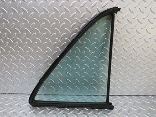 W123 rear left quarter window glass used OEM