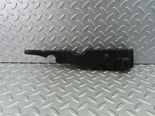 W123 bonnet catch cover used OEM
