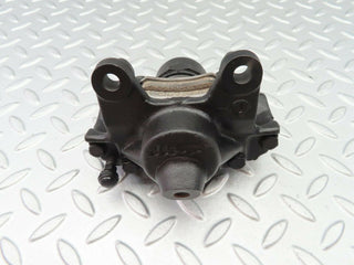 W124 Wagon rear left brake caliper used OEM