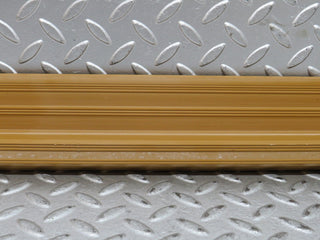 W123 rear left door sill trim palomino used OEM
