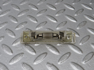 R129 SL number plate light used OEM
