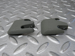 W124 front seat rail trim cover pair used OEM