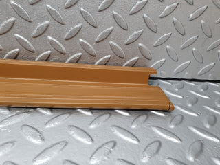 W124 front left door sill trim palomino used OEM