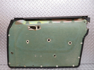 W123 front left door card black used OEM