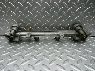 W124 Coupe fuel injector rail used OEM